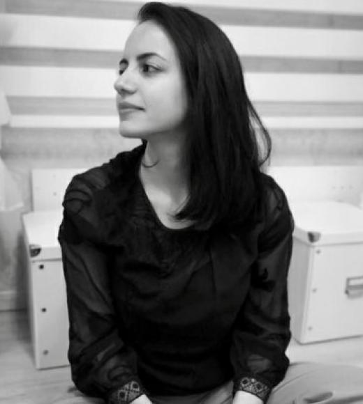 Black and white photo of a woman starting to the side